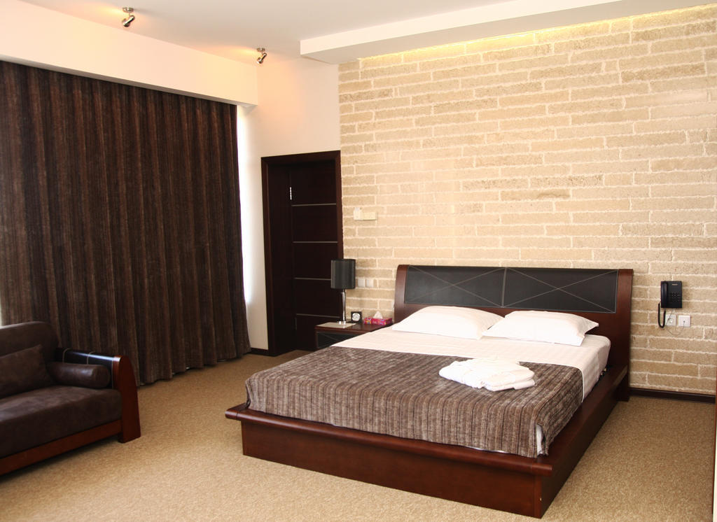 Grand M Hotel Navoi Habitación foto